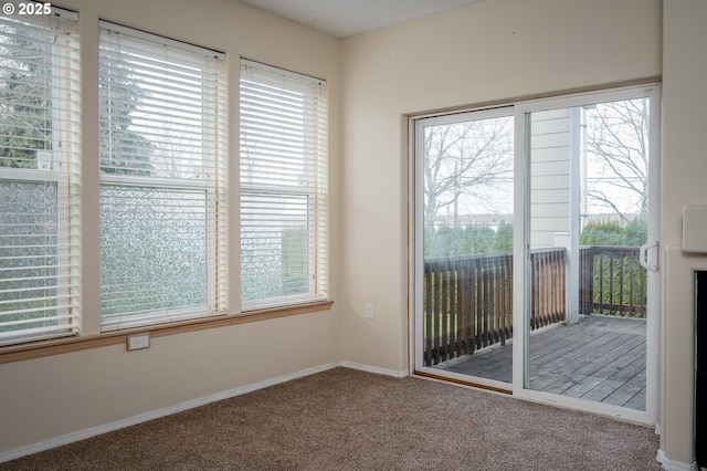 empty room featuring carpet flooring