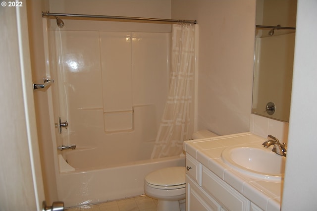 full bathroom featuring tile patterned flooring, vanity, shower / bath combo, and toilet