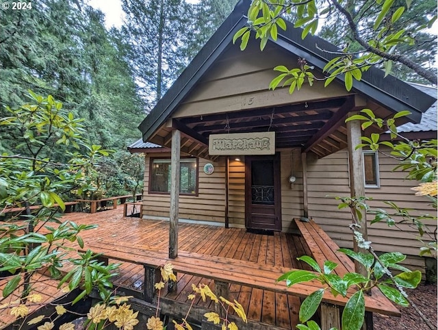 entrance to property with a deck