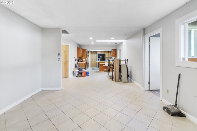 basement with light tile patterned floors