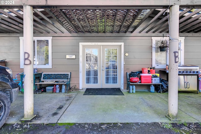 entrance to property featuring french doors