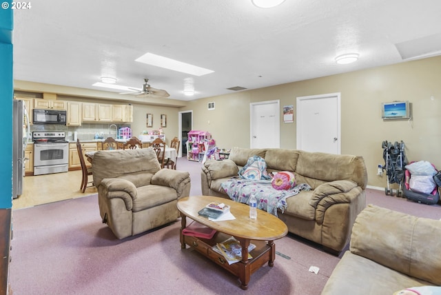 living room with ceiling fan