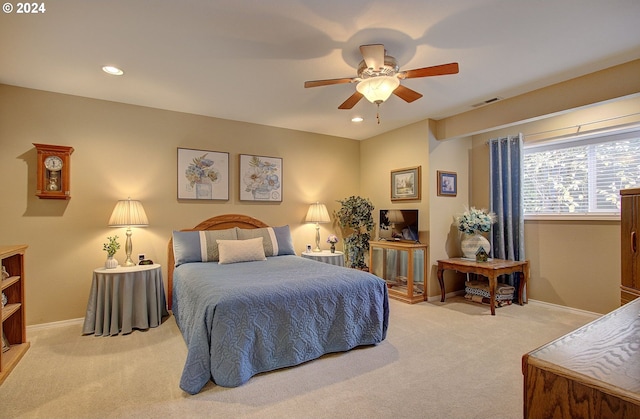 carpeted bedroom with ceiling fan