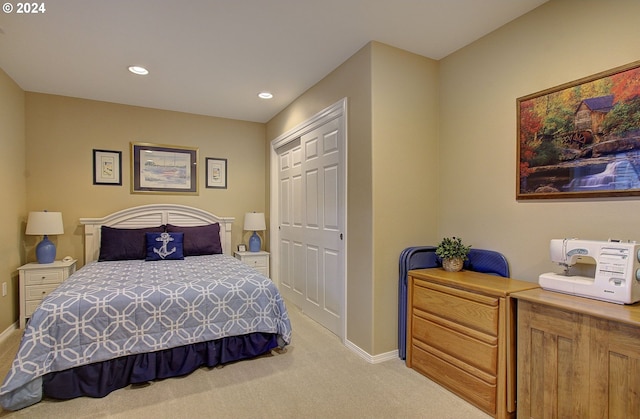 carpeted bedroom featuring a closet