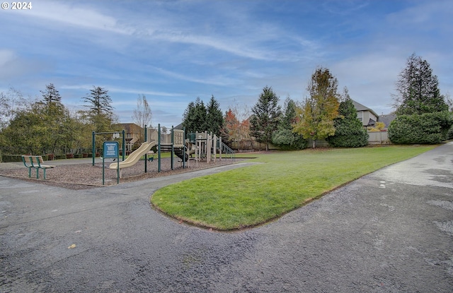 view of jungle gym featuring a yard