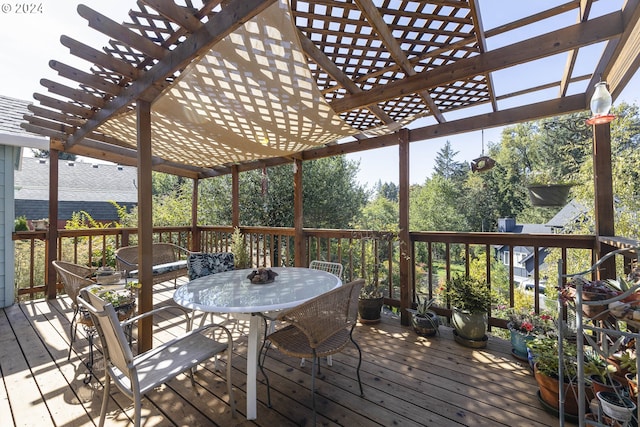 wooden deck featuring a pergola