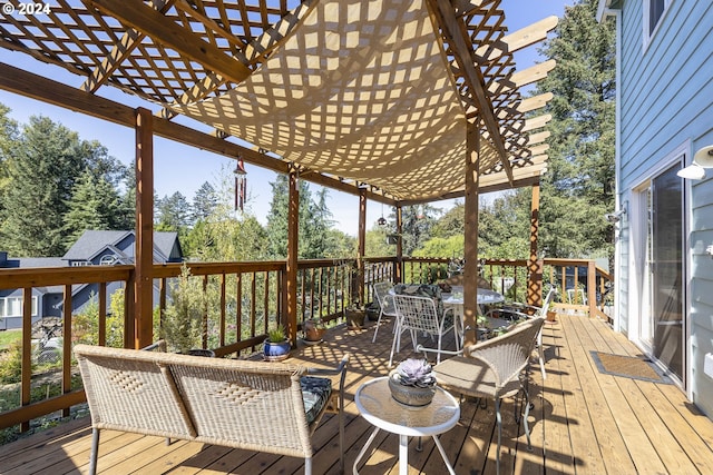 wooden deck featuring a pergola