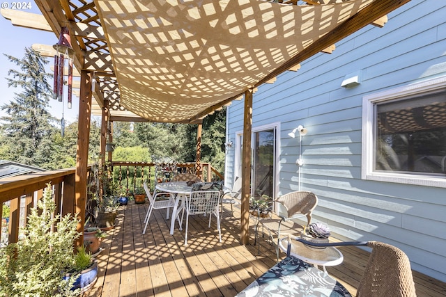 wooden deck featuring a pergola