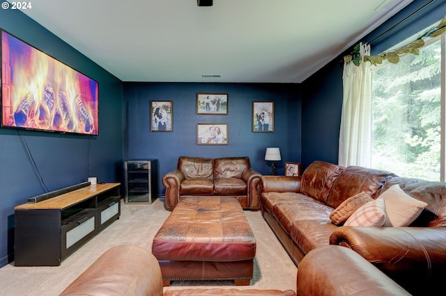 living area with carpet floors and visible vents