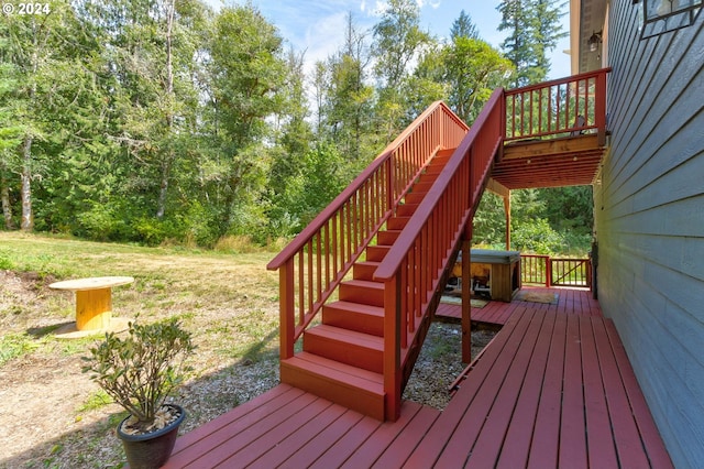 wooden deck featuring stairs