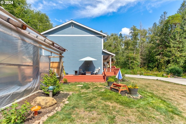 view of yard featuring a wooden deck