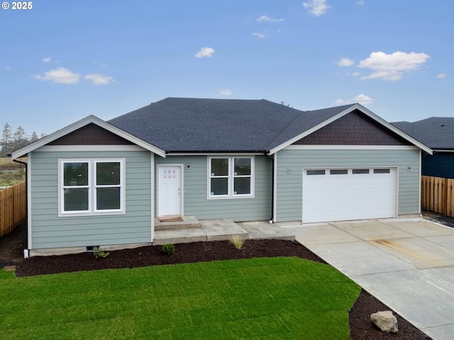 ranch-style home with a garage and a front yard