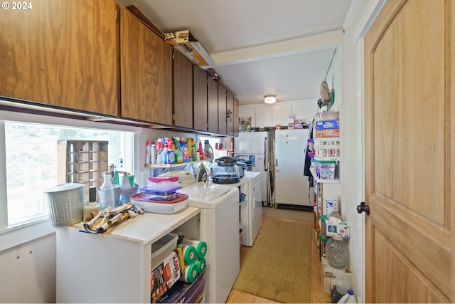 laundry room with washing machine and clothes dryer