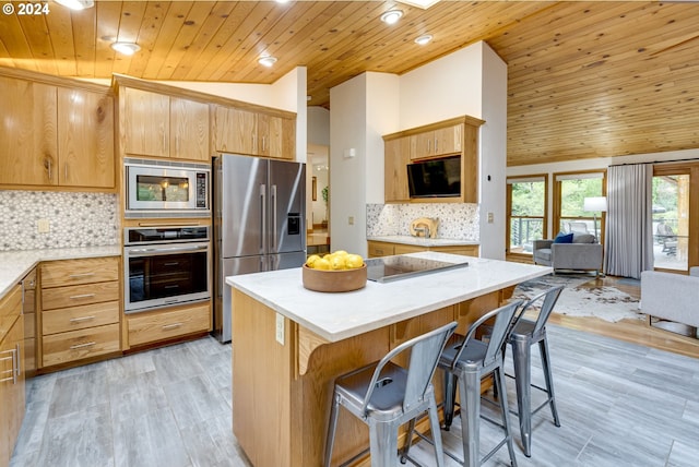 kitchen featuring light wood-type flooring, tasteful backsplash, stainless steel appliances, wood ceiling, and lofted ceiling