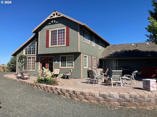 rear view of property with a patio area