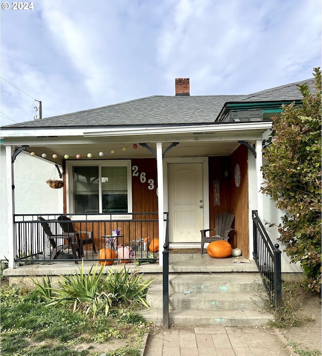 view of front of house with covered porch