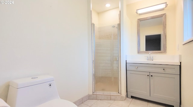 bathroom featuring tile patterned floors, vanity, walk in shower, and toilet