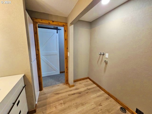 bathroom featuring hardwood / wood-style flooring and vanity