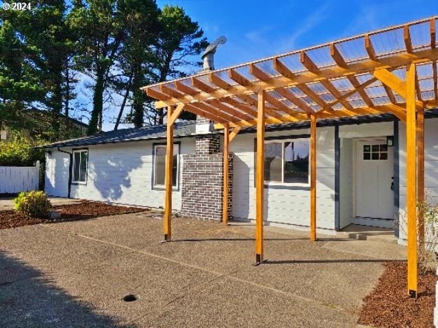 exterior space with a pergola