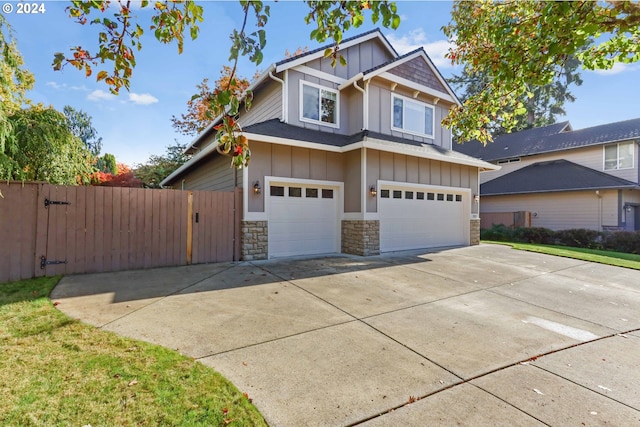 craftsman inspired home with a garage