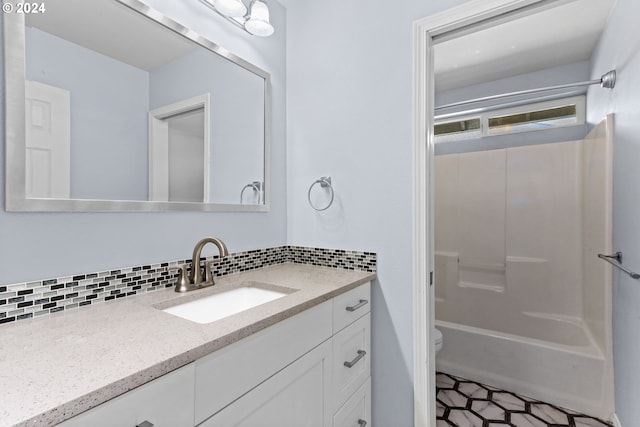 3501 SE 171st Ave, Vancouver, WA 98683 - bathroom featuring vanity, tasteful backsplash, and shower / bath combination