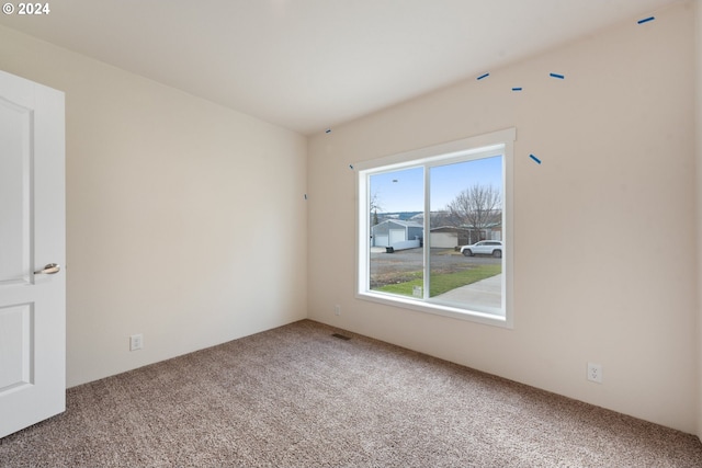 view of carpeted spare room