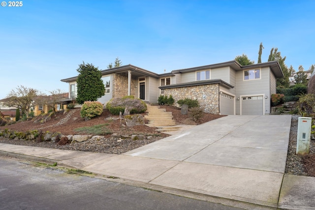 view of front of home with a garage