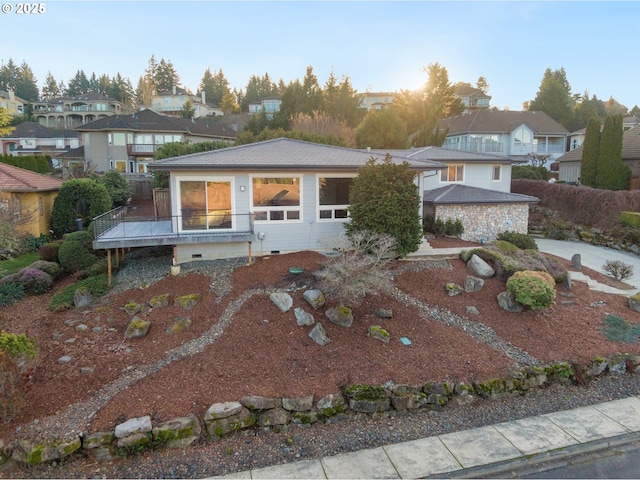 view of front of property featuring a deck