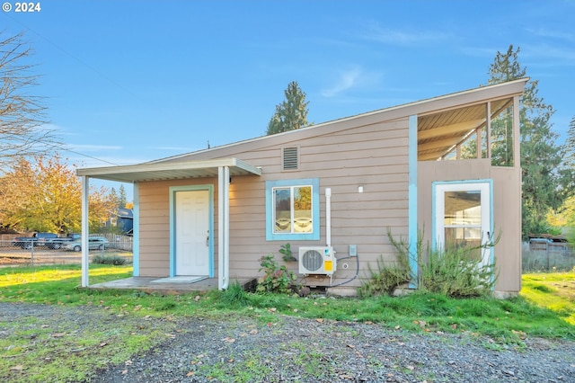 view of front of house featuring ac unit