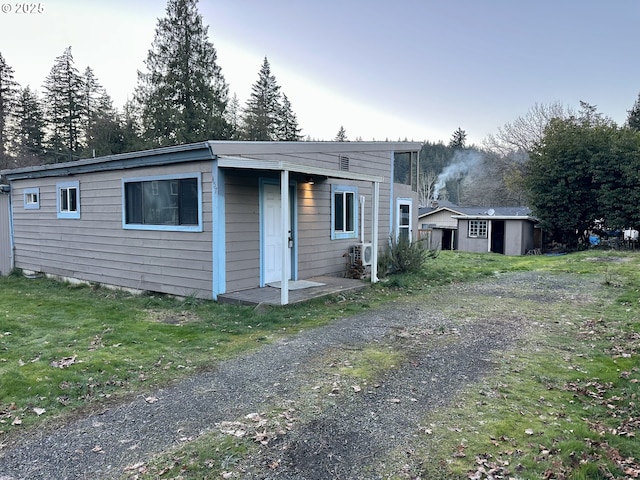 view of front of home with a front lawn