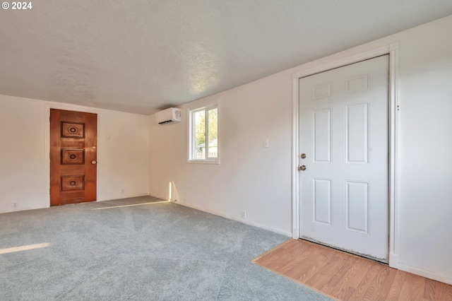 spare room with a wall unit AC