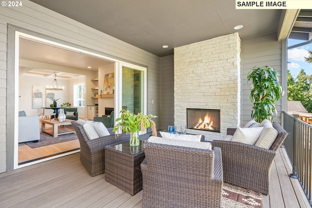 living area with light wood-type flooring, a healthy amount of sunlight, and recessed lighting