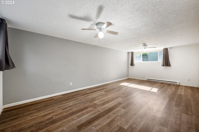 unfurnished room featuring a baseboard radiator, a textured ceiling, ceiling fan, and wood-type flooring