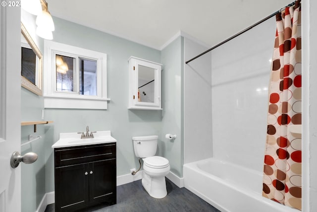 full bathroom featuring vanity, toilet, and shower / bath combo with shower curtain