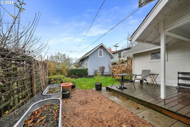 view of yard with a deck