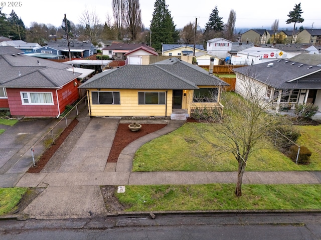 view of front of home with a front lawn