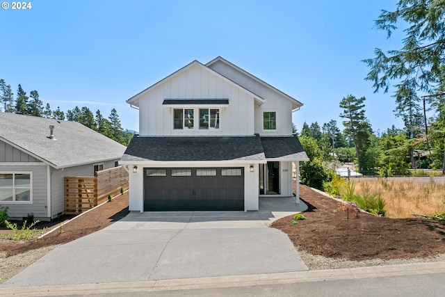 modern farmhouse style home with a garage