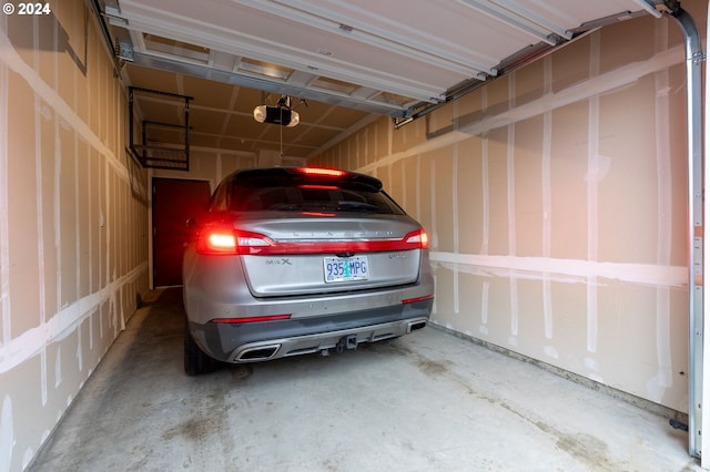 garage featuring a garage door opener