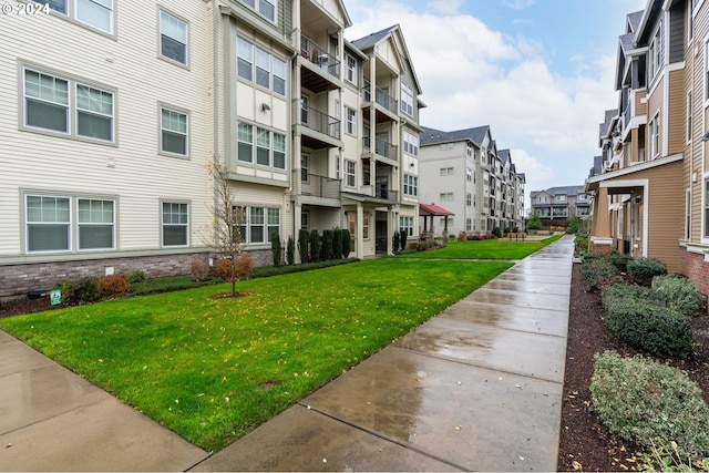 view of community with a lawn