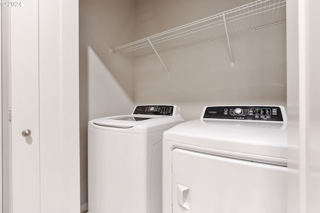 laundry area featuring washing machine and dryer