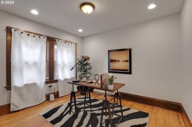 office space with light hardwood / wood-style floors