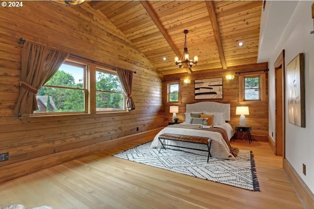 bedroom with wood ceiling, light hardwood / wood-style flooring, and wood walls