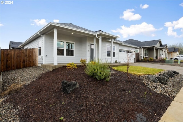 single story home featuring a garage