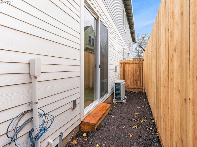 view of property exterior featuring central AC