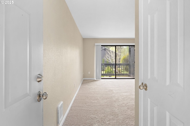 9480 SW 146th Ter Unit Q1, Beaverton, OR 97007 - carpeted empty room featuring baseboards and a textured wall