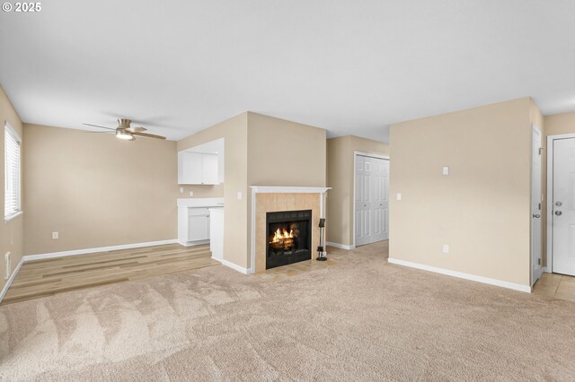 9480 SW 146th Ter Unit Q1, Beaverton, OR 97007 - living area with light carpet, ceiling fan, and baseboards