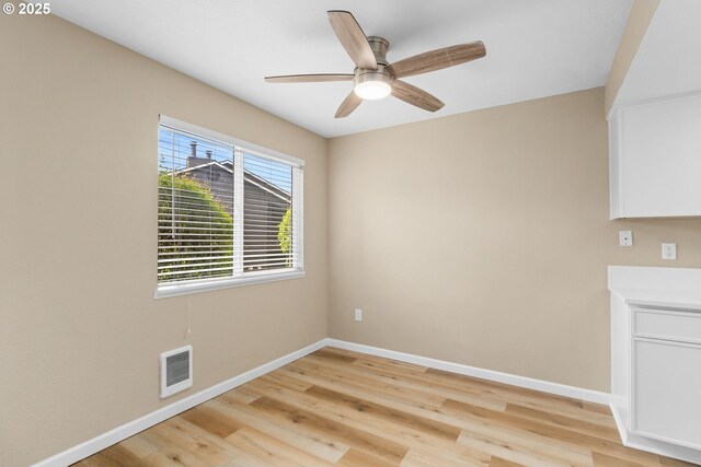 9480 SW 146th Ter Unit Q1, Beaverton, OR 97007 - unfurnished room featuring baseboards, light wood-type flooring, and ceiling fan