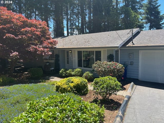 single story home with a garage