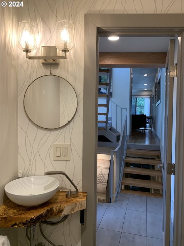 bathroom with tile patterned flooring