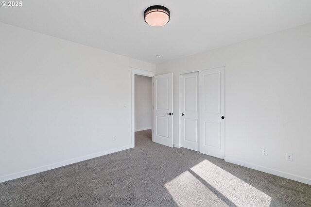 11108 NE 91st Ave, Vancouver, WA 98662 - unfurnished bedroom featuring baseboards, carpet floors, and a closet